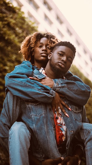 Couple Wearing Blue Denim Jacket