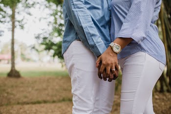 Couple Wearing White Pants