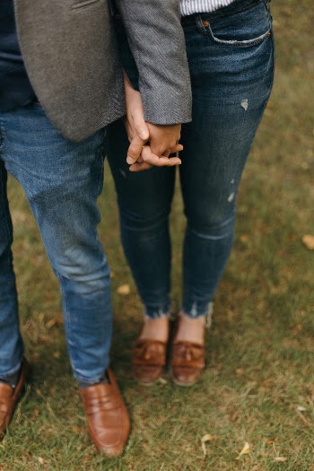 couple with jeans and leather shoes