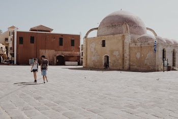 Couples Walking in Front of Dome Building
