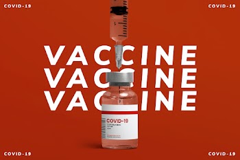 COVID-19 vaccine injection glass vial with syringe