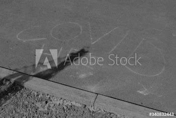COVID life phrase written on the street
