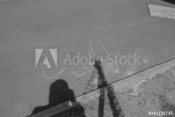 COVID life phrase written on the street