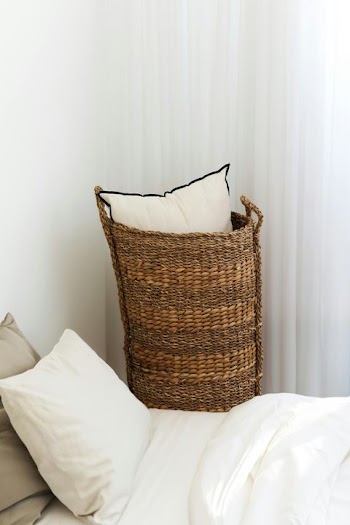 Cozy Bedroom Corner with Woven Basket