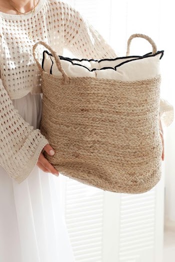 Cozy Woven Storage Basket with Decorative Pillows