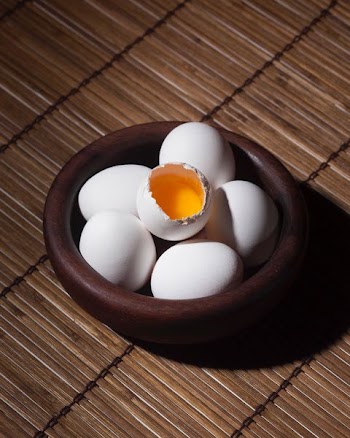 cracked egg on eggs
