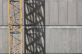 Crane Shadow On Building