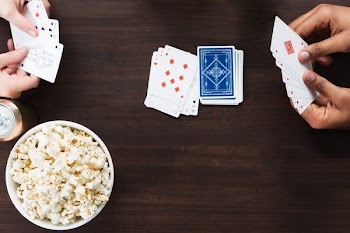 Crazy Eights Card Game At Table
