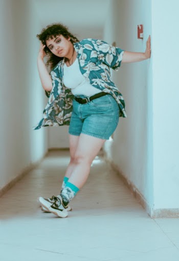 Crazy portrait of a young over sized girl enjoying her youth and celebrating life.