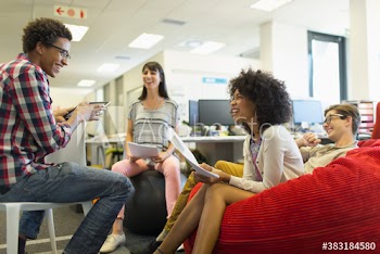 Creative business people with paperwork in meeting