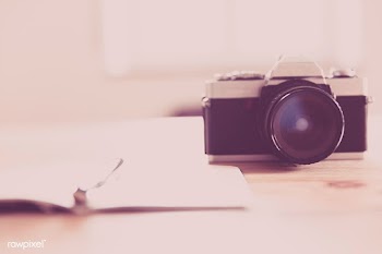 Creative desk with camera and notebook | Free public domain photo - 432063