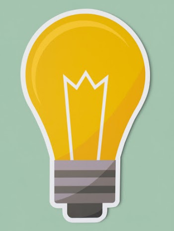 Creative light bulb icon isolated
