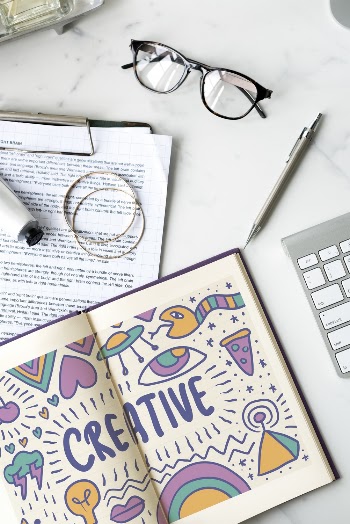 Creative Story Book Near Black-framed Eyeglasses