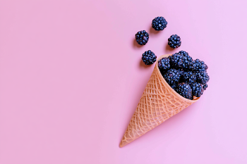 Crisp Waffle Cone Filled with Fresh Blackberries