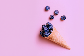 Crisp Waffle Cone Filled with Fresh Blackberries