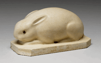 crouching rabbit with small ears | Free Photo - rawpixel