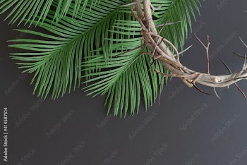 crown of thorns and green palm leaves