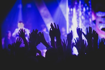 Crown Raising Hands during Performance
