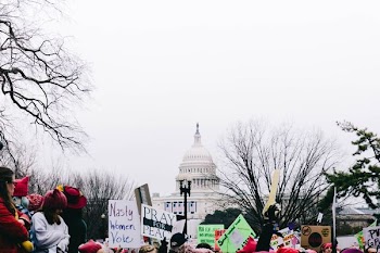 crown standing near The White House at daytime