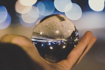Crystal Ball on Person's Hand