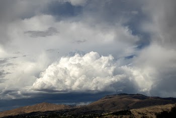 Cumulus Clouds Above Mountains