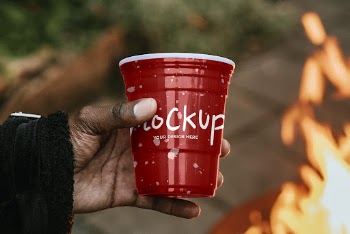 Cup mockup psd being held | Free PSD Mockup - rawpixel