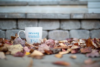 Cup on Ground With Dry Leaves
