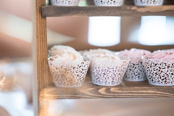 Cupcake on Brown Wooden Shelf