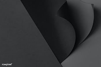 Curled black chart paper on a dark gray background | Free  photo - 2375735
