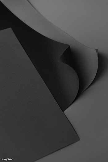 Curled black chart paper on a dark gray background | Free  photo - 2375746