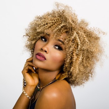 Curled Hair Woman Making a Pose