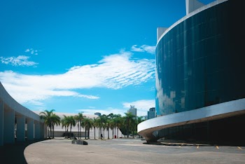 Curtain Wall Building Under Clear Blue Sky