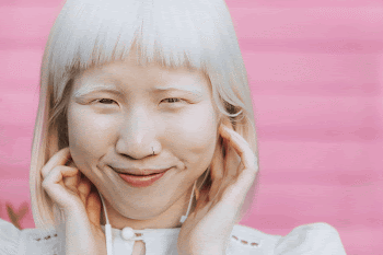 Cute Albino girl listening to music | Free Photo - rawpixel