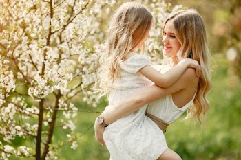 Cute and stylish family in a spring park Free Photo