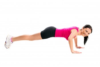 Cute brunette woman during fitness exercise Free Photo
