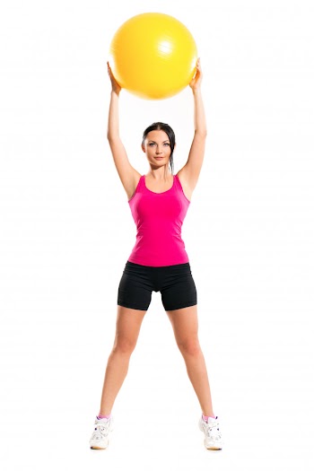 Cute brunette woman during fitness exercise Free Photo