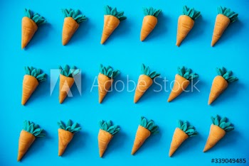 Cute carrots as a colorful pattern