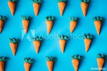 Cute carrots as a colorful pattern