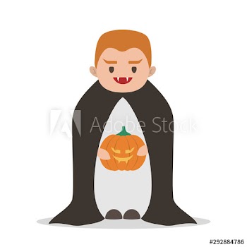 Cute child in a halloween vampire costume
