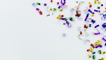 Cute new year colourful accessories on white background Free Photo