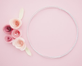 Cute ornamental frame with paper flowers Free Photo