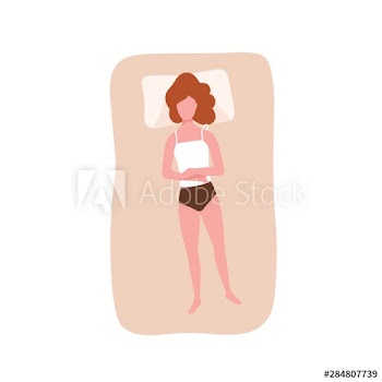 Cute redhead woman sleeping on her back