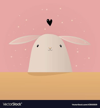 cute white rabbit sitting at the table