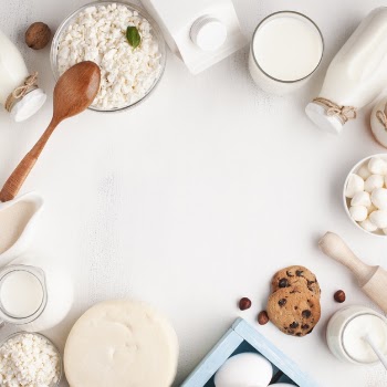 Dairy products frame on white background Free Photo