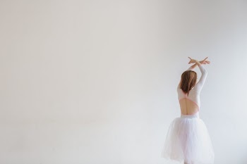 Dancer In White On White