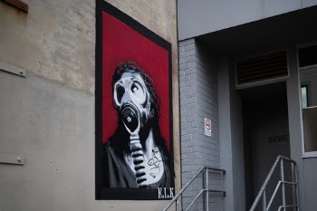Dark and unique piece of street art in Perth's Wolf Lane district. 