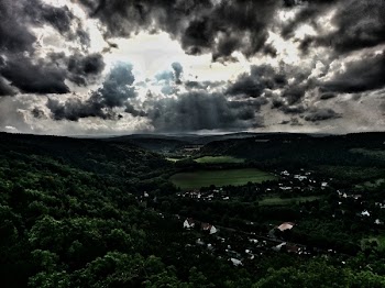 Dark Cloud Formation over Land Terrain