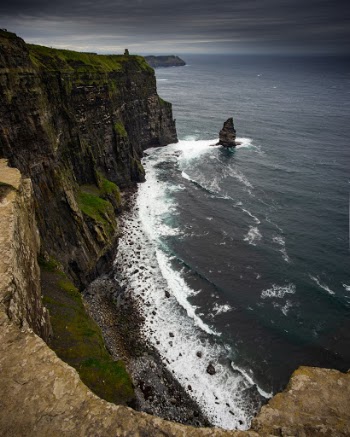 Dark skies over the Cliffs of Moher, Ireland. 