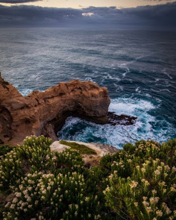 Dawn breaks on the Pacific Ocean along the Great Ocean Road in southern Australia. 
