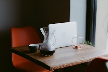 Decanter Near Teacup on Table
